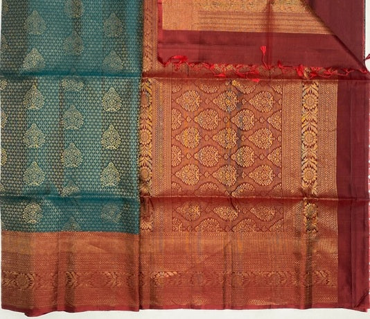 Aavani peacock green color body & maroon color pallu , blouse pure silk saree