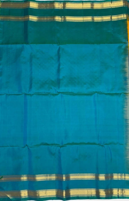 Manjal Neelam mango yellow color body & bluish green color pallu,blouse - Pure silk saree