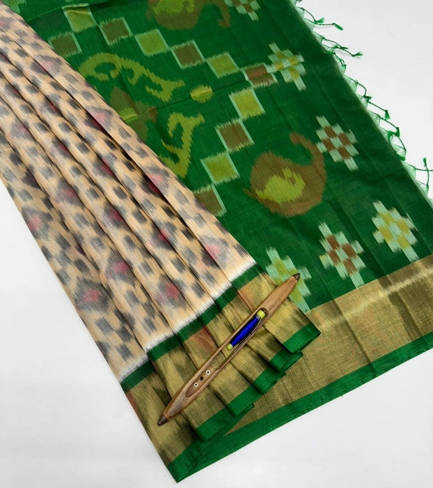 Vaana pochampally silk cotton saree light sandal color body & green color pallu , blouse.