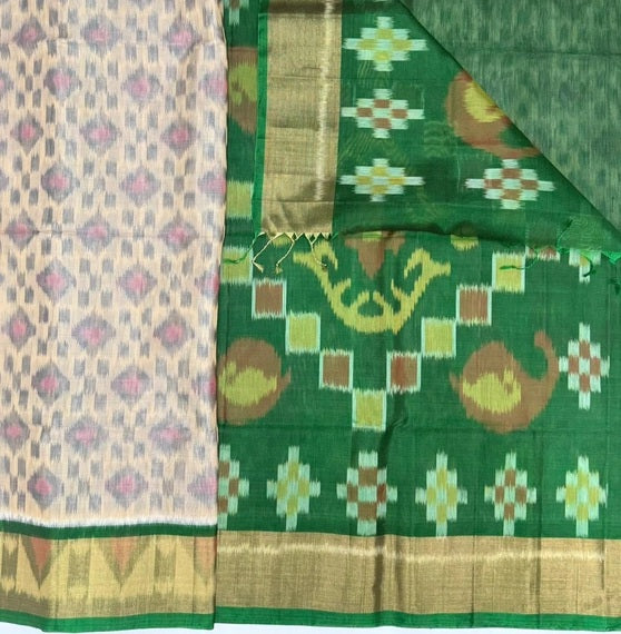 Vaana pochampally silk cotton saree light sandal color body & green color pallu , blouse.