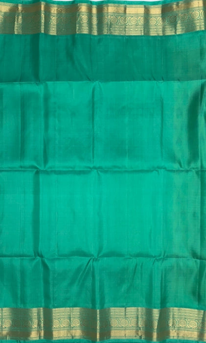 Ponnoli bright yellow color body & rexona green color pallu , blouse - Pure silk saree