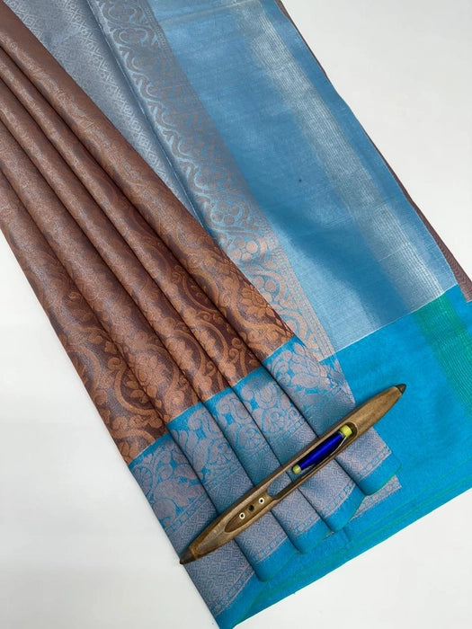 Janu art silk saree - maroon with silver color body & blue color pallu , blouse.