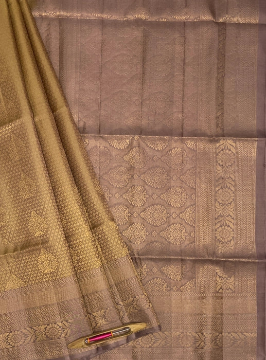 Thangam light golden color body & chocolate brown color pallu , blouse pure silk saree