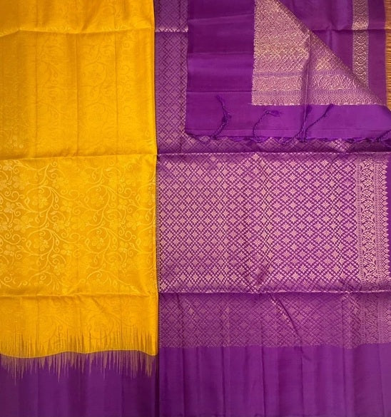 Kanaka bright yellow color body & violet color pallu , blouse pure silk saree