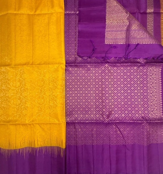 Kanaka bright yellow color body & violet color pallu , blouse pure silk saree