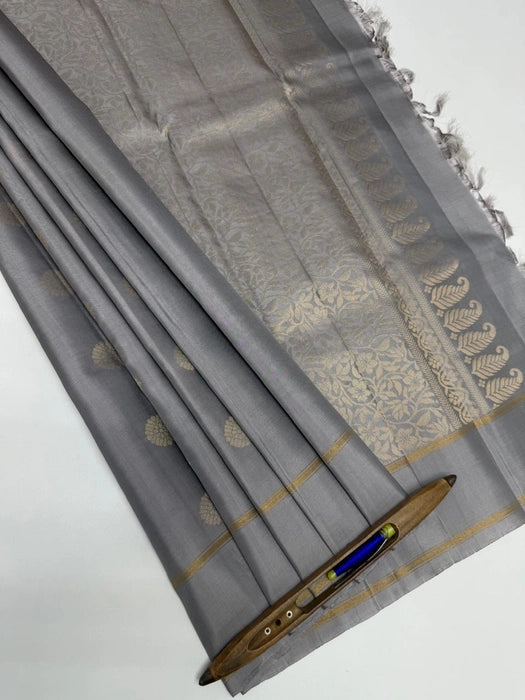 Kanima light grey color body, pallu , blouse pure silk saree