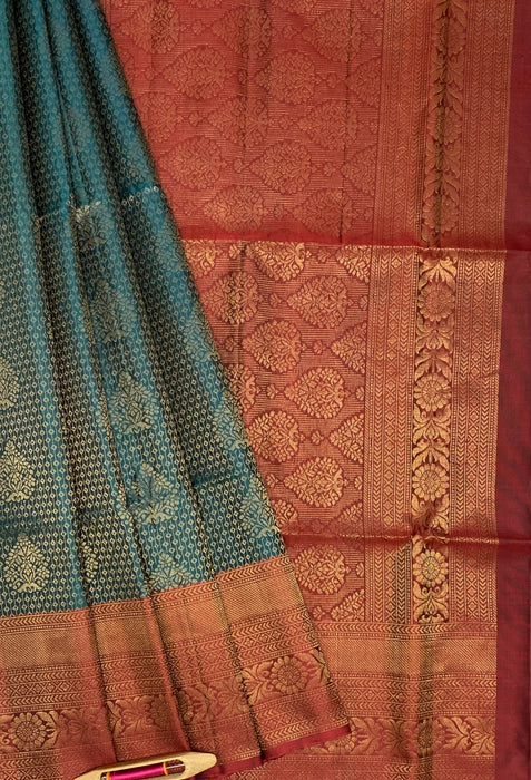 Aavani peacock green color body & maroon color pallu , blouse pure silk saree