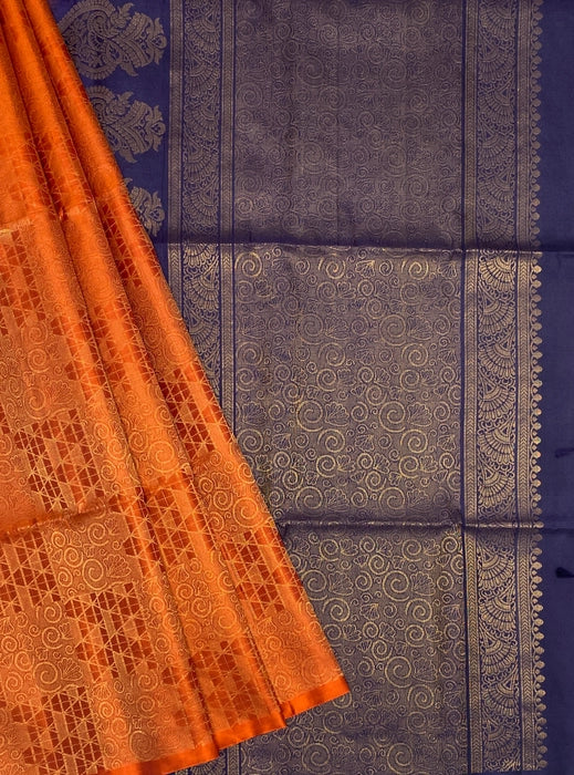 Vannathi  orange color body & navy blue color pallu , blouse pure silk saree
