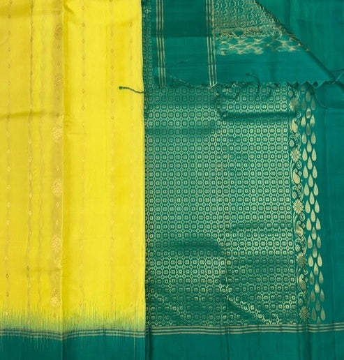 Ezhil light lemon yellow color body & teal green color pallu , blouse - Pure silk saree