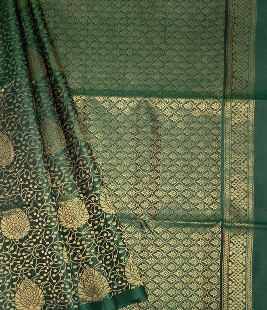 Kavini bottle green color body, pallu , blouse pure silk saree
