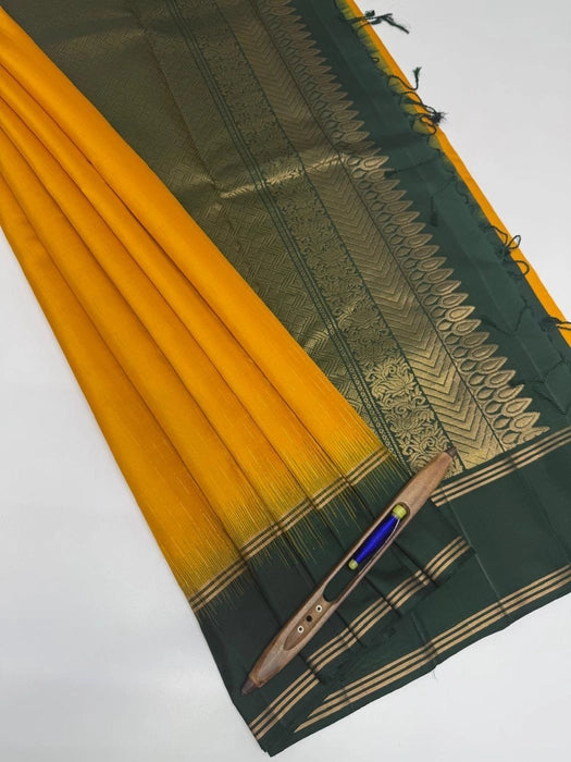 Tejasvi lemon yellow color body & bottle green color pallu , blouse - Pure silk saree