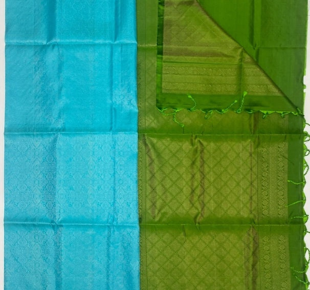 Vamika light blue color body & olive green color pallu , blouse pure silk saree