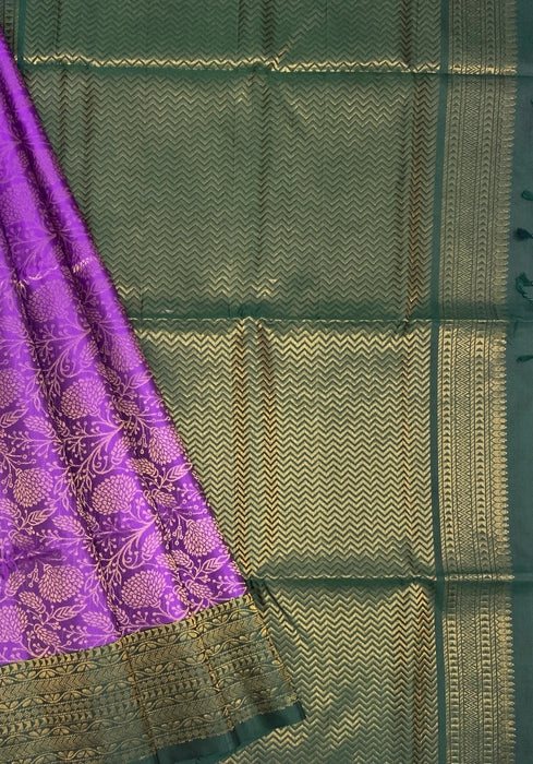 Sindhu violet color body & bottle green color pallu , blouse pure silk saree